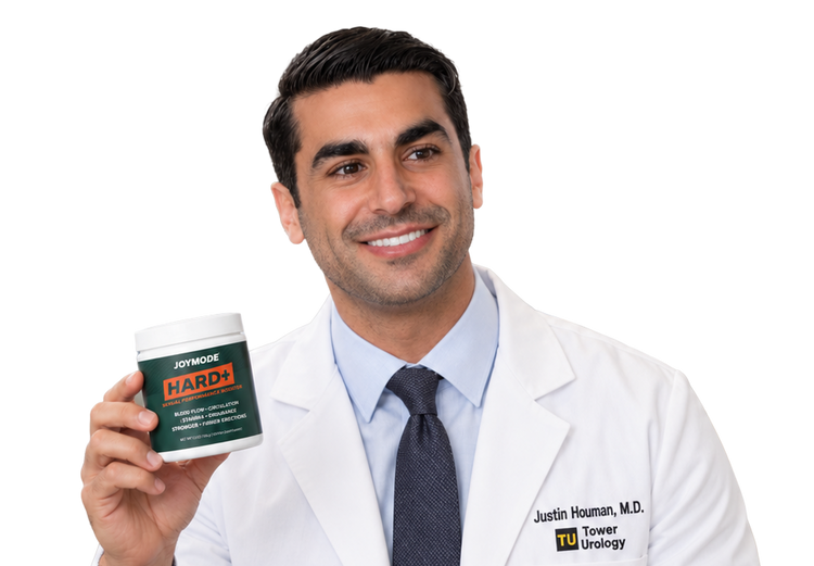 Dr. Justin Houman holding Hard+ (mobile v2)